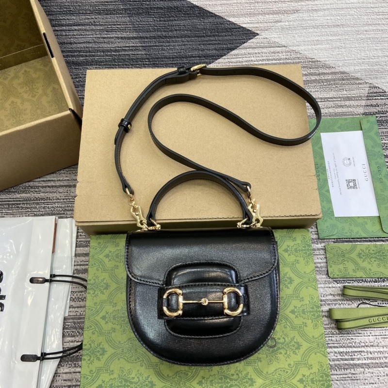 G*u*i top handle bags
